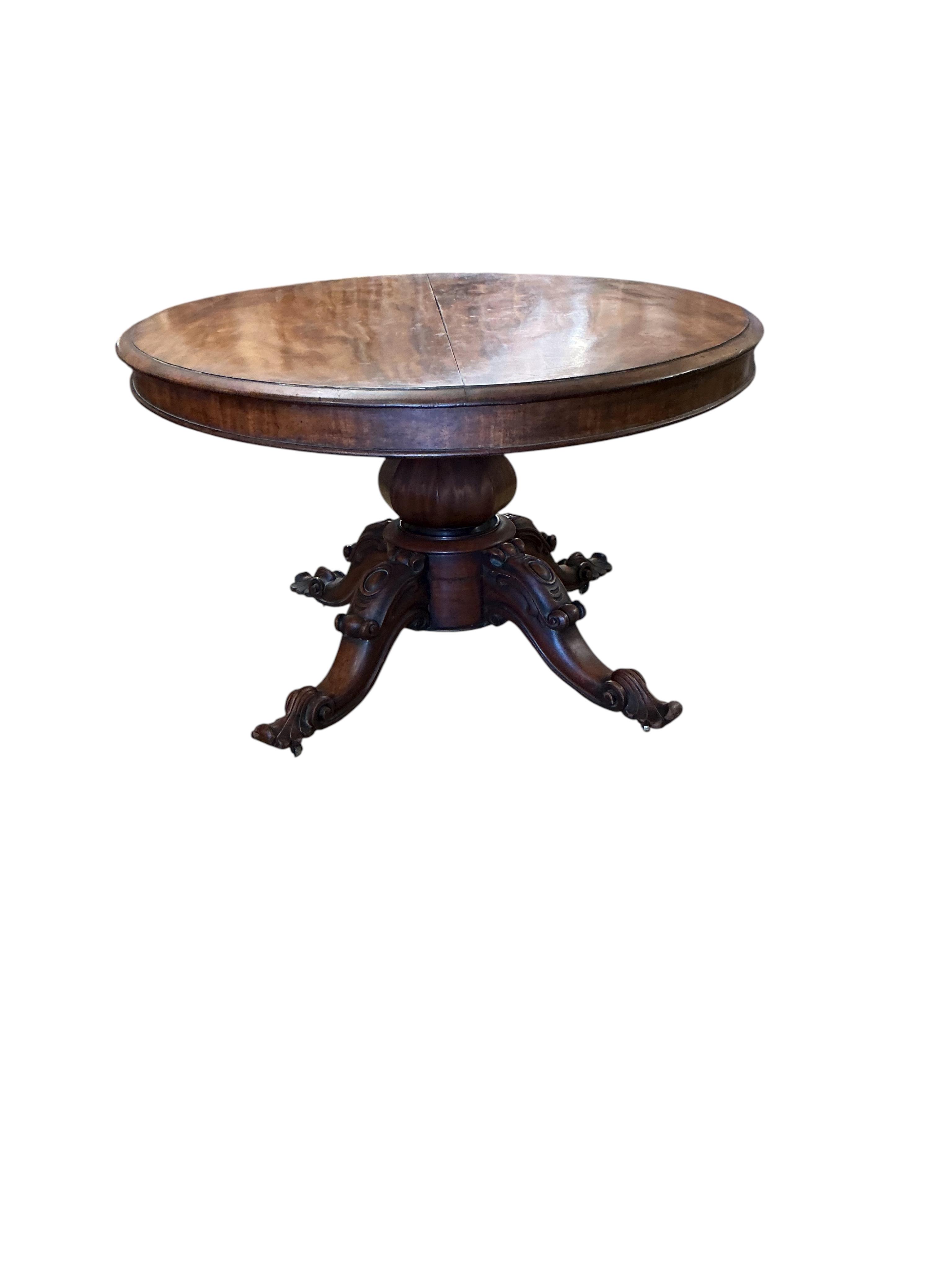 An early Victorian oval mahogany tilt top loo table, width 108cm, depth 140cm, height 71cm